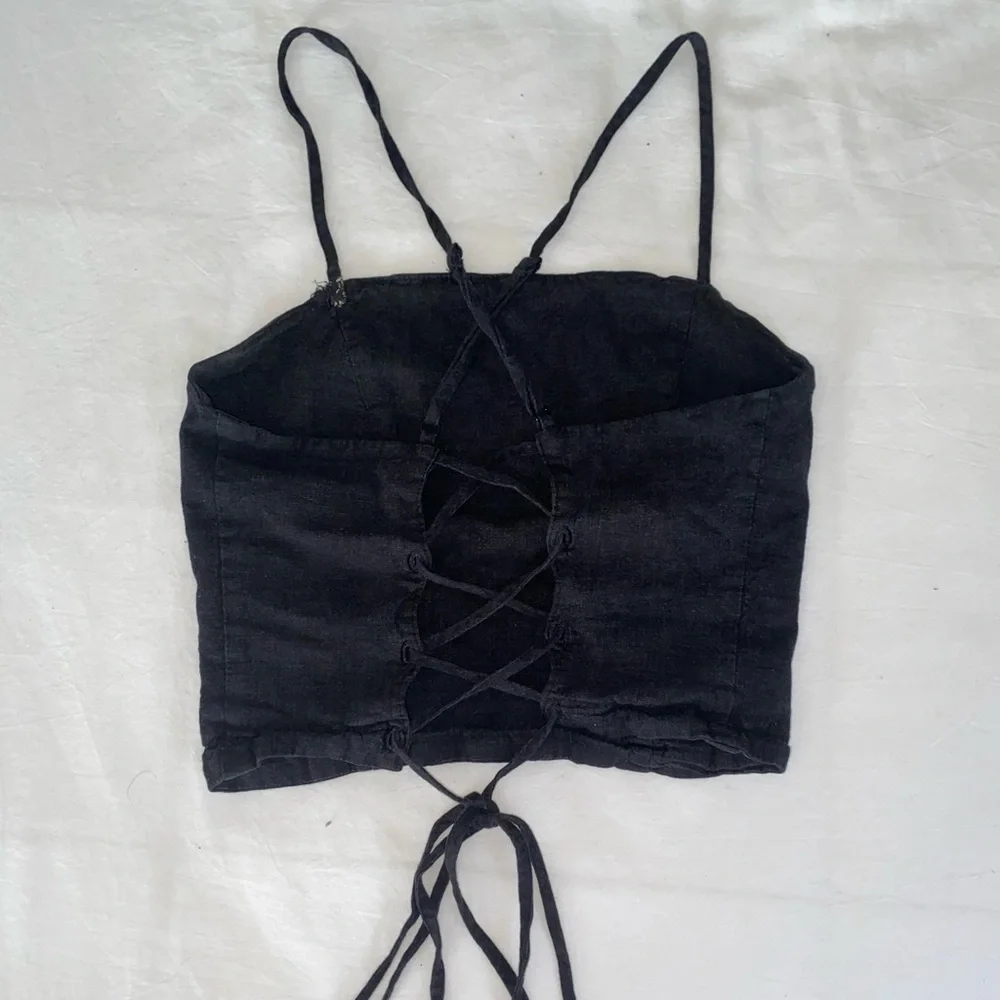 Cropped black shirt with lace up back - Picture 2 of 3